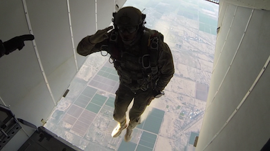 Michael Kurta jumping out of a flying vehicle