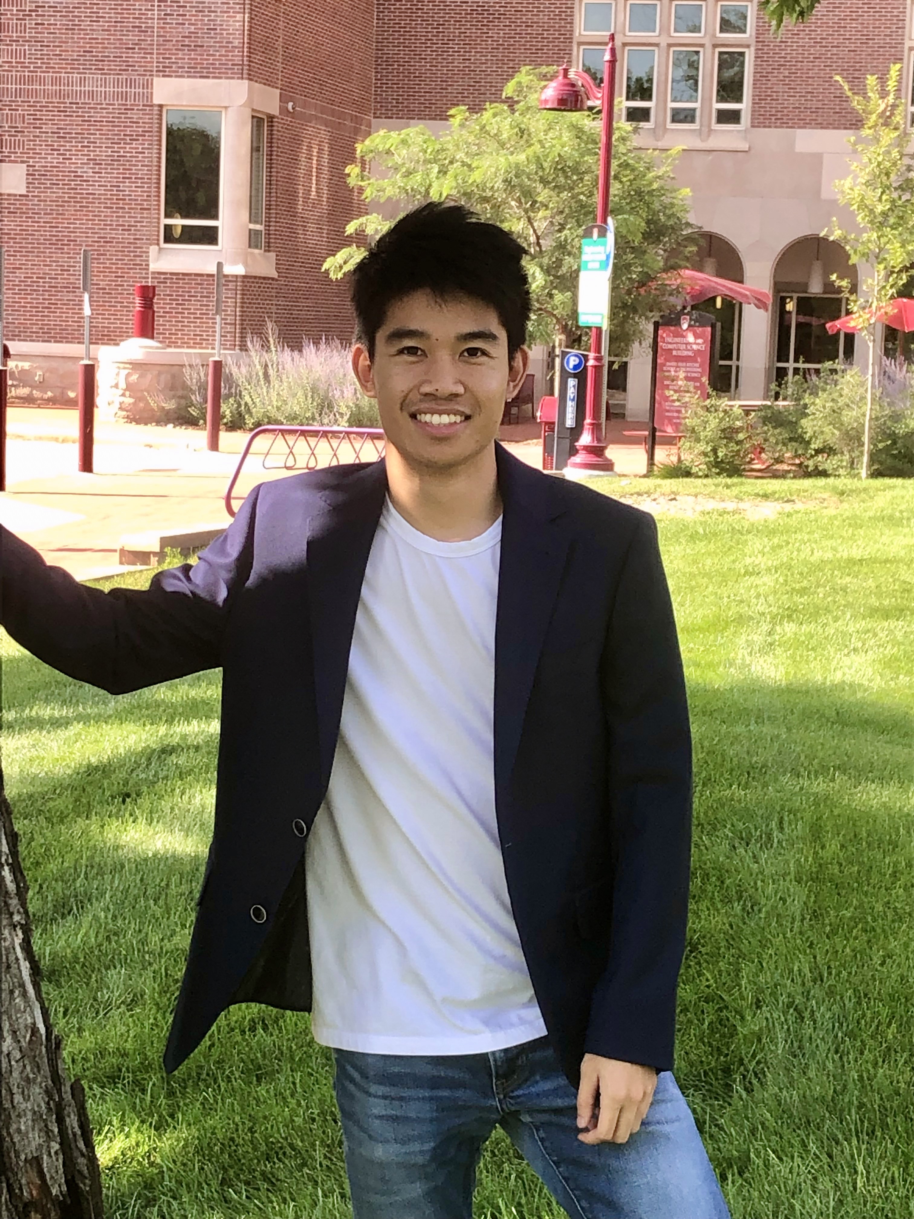 Gary Doan standing outside the Ritchie School building