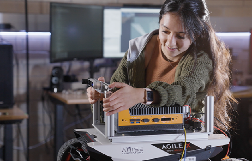 Student working on robot