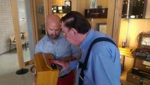 Richard Quine, right, and Stewart Cohune examine a piece of old engineering equipment. The tool and others are on display on the fifth floor of the engineering building